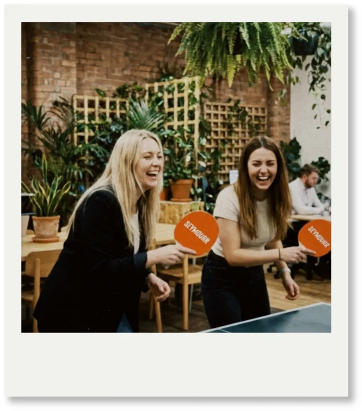 Two Seymourr team members in conversation
